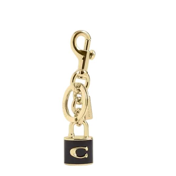 Coach Accessories - Coach Black & Gold Lock Bag Charm